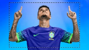 na imagem, o jogador de futebol felipe coutinho aparece com a camisa azul da seleção dentro de um quadrado pontilhado